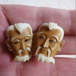 Vintage screw back carved face earrings